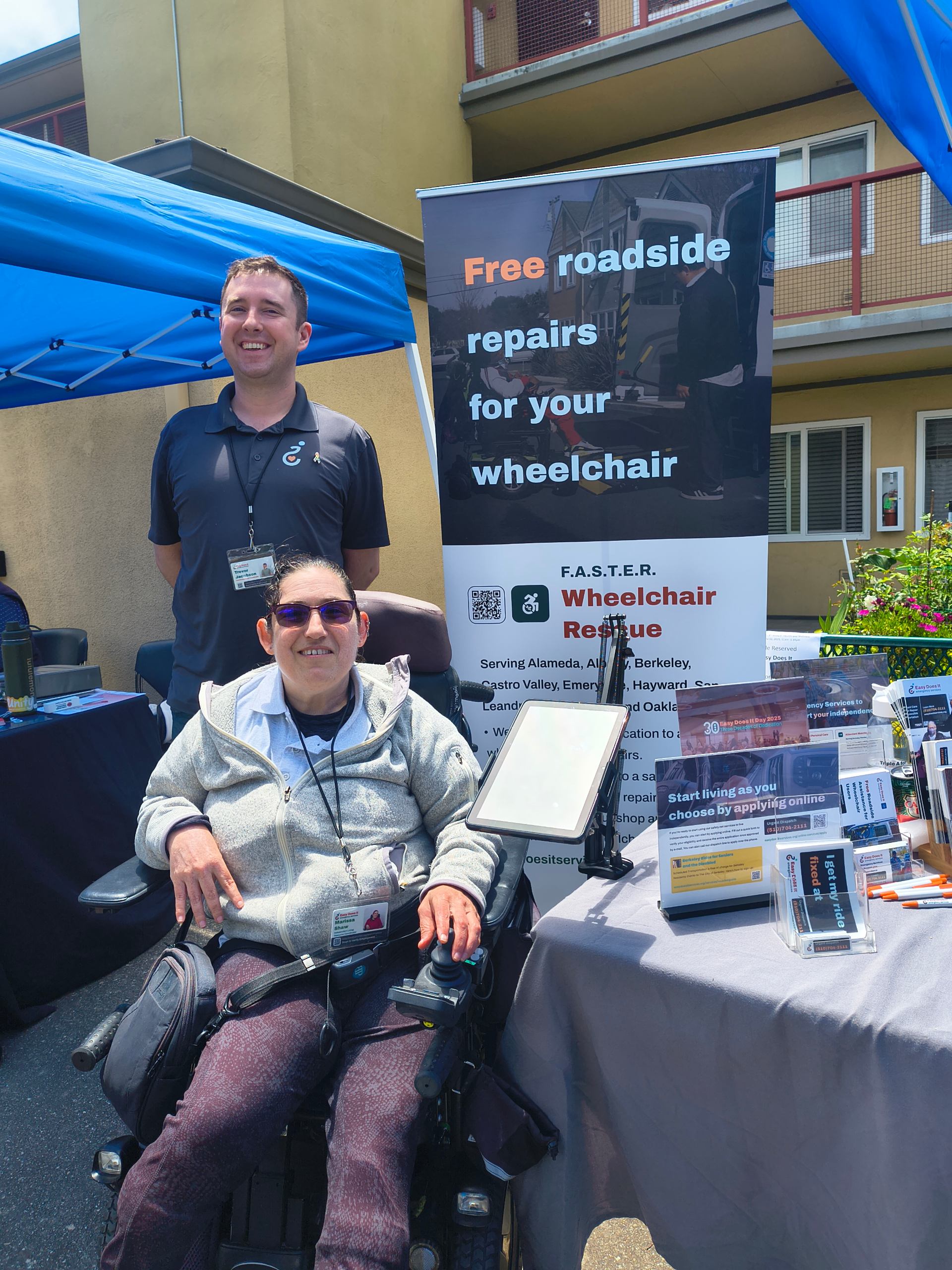 A photo of Easy Does it's table runner and Merch at an Outreach Event.