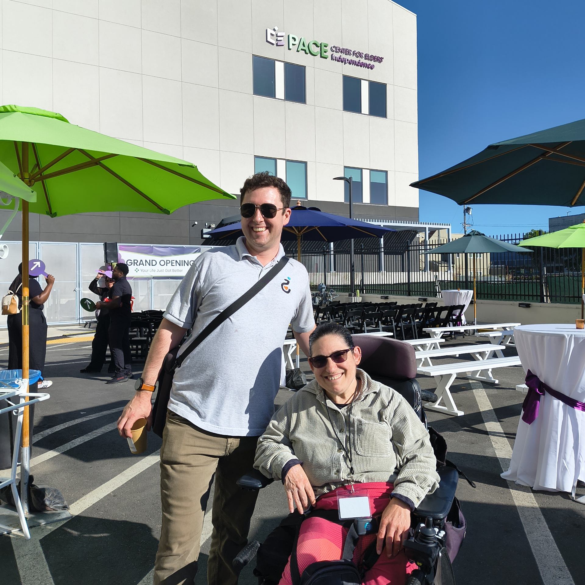 Trevor and Marissa pose for a photo in front of one of CEI's brand new wellness centers.