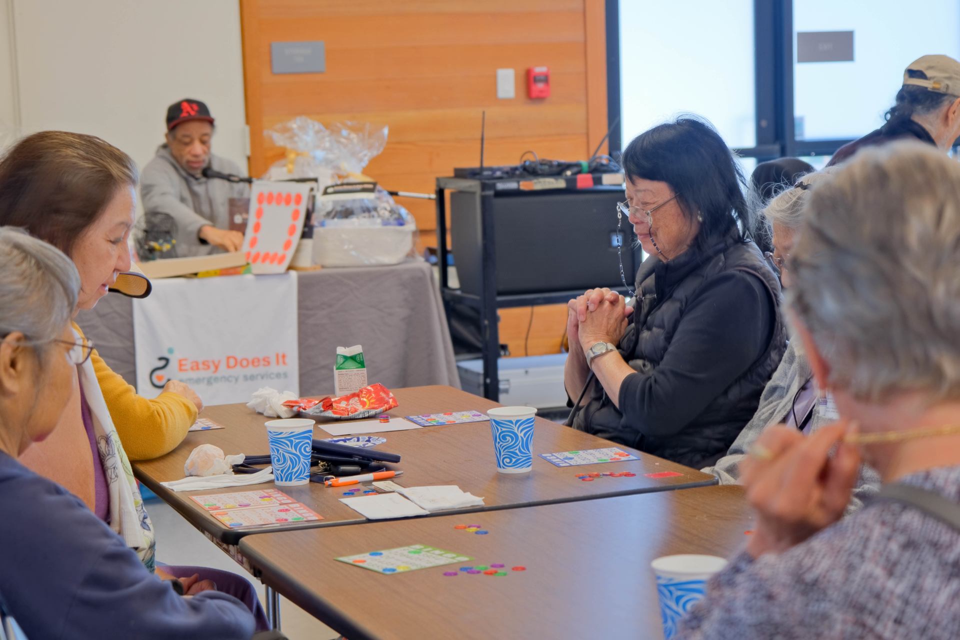 A group of people sitting at a table Description automatically generated
